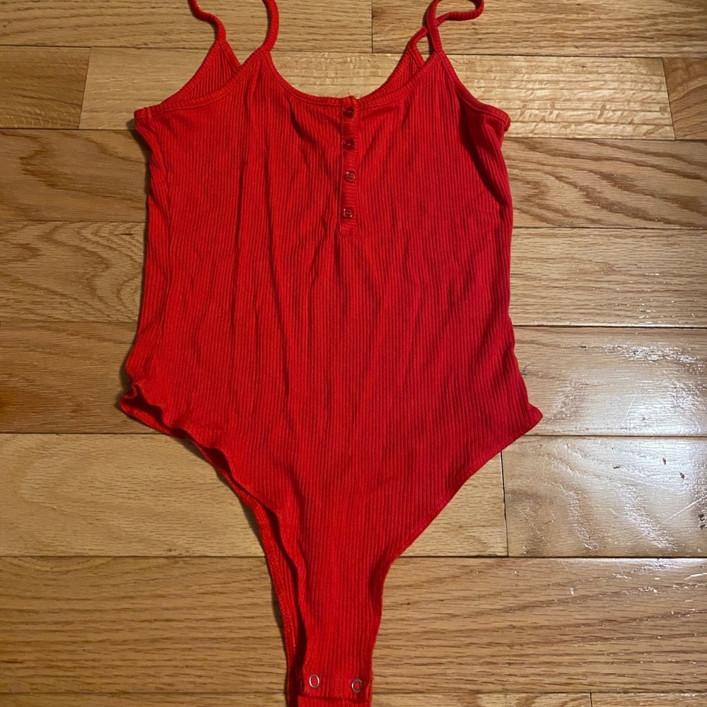 RED RIBBED BODY SUIT